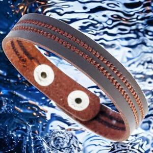 Brown leather double stitched thin bracelet with silver color snap closure